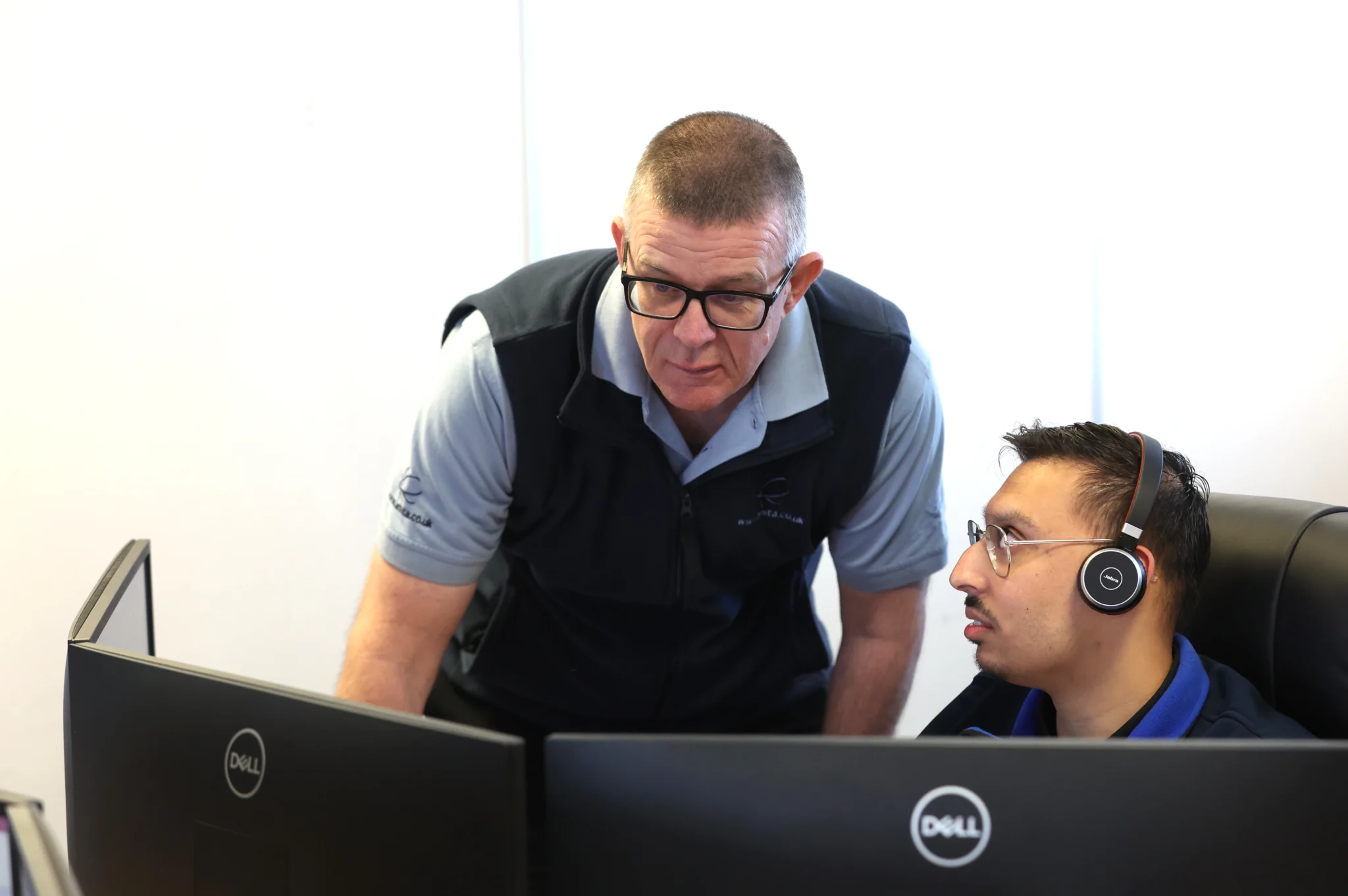 a man checking in a work