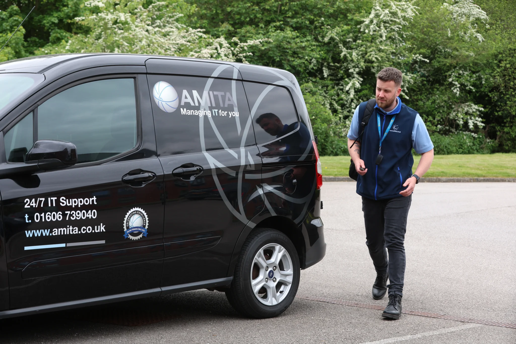 a man walking away from van
