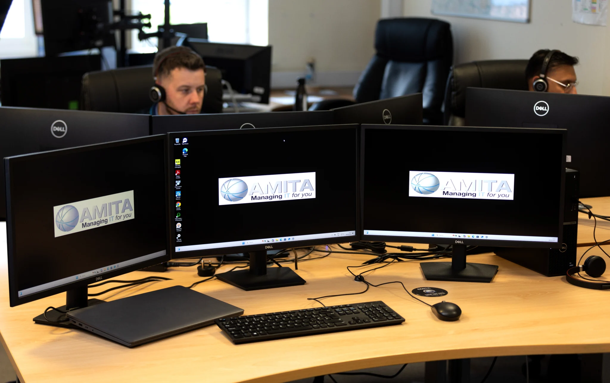 amita monitors showing its logo